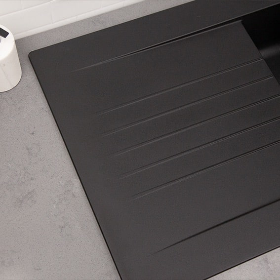 Close up of a Black One & A Half Bowl Fibr Composite Kitchen Sink