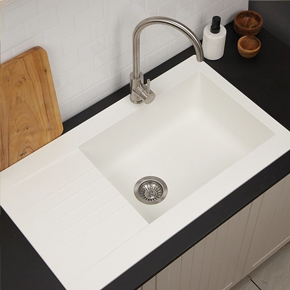 Experience the perfect blend of style and functionality with this spacious single bowl composite kitchen sink in white